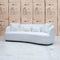 The Santorini Curved Three Seat Sofa - Boucle Ivory available to purchase from Warehouse Furniture Clearance at our next sale event.