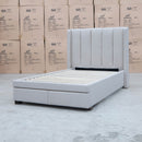 The Hudson King Single Fabric Storage Bed - Oat White available to purchase from Warehouse Furniture Clearance at our next sale event.