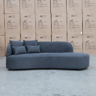 The Santorini Curved Chaise Sofa - Lance Charcoal available to purchase from Warehouse Furniture Clearance at our next sale event.