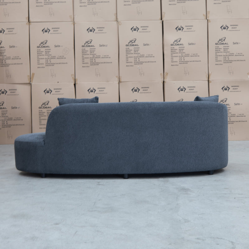 The Santorini Curved Chaise Sofa - Lance Charcoal available to purchase from Warehouse Furniture Clearance at our next sale event.