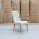The Semillon Upholstered Natural Frame Dining Chair - Oat available to purchase from Warehouse Furniture Clearance at our next sale event.
