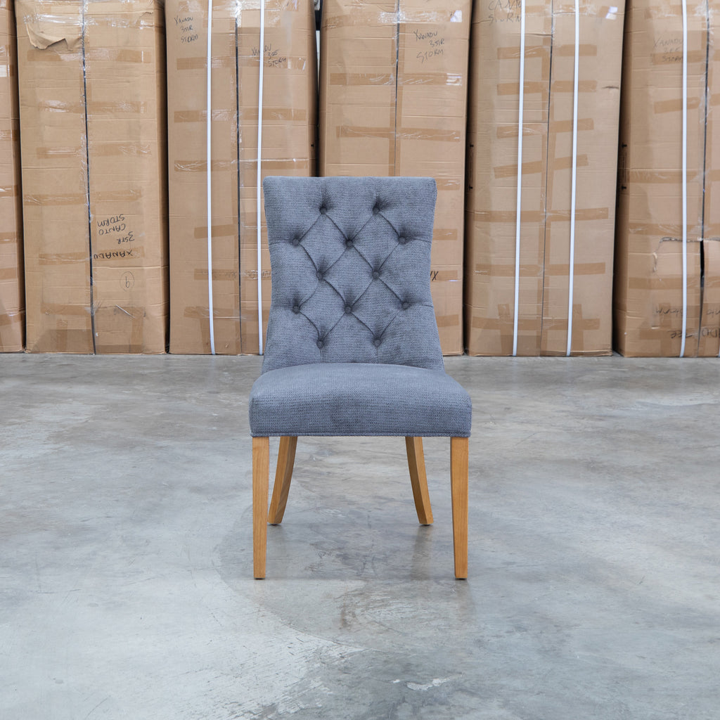 The Semillon Upholstered Natural Frame Dining Chair - Share Charcoal available to purchase from Warehouse Furniture Clearance at our next sale event.