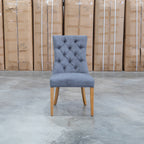 The Semillon Upholstered Natural Frame Dining Chair - Share Charcoal available to purchase from Warehouse Furniture Clearance at our next sale event.