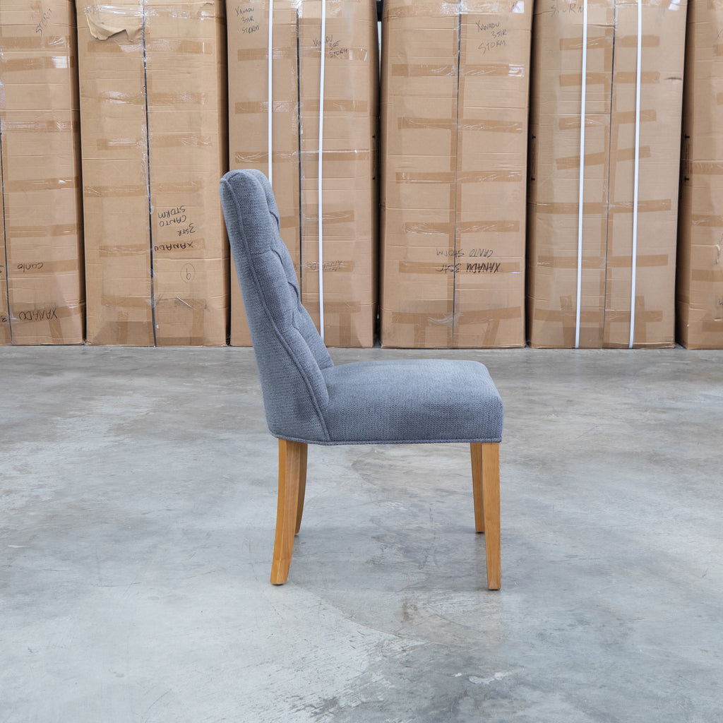 The Semillon Upholstered Natural Frame Dining Chair - Share Charcoal available to purchase from Warehouse Furniture Clearance at our next sale event.