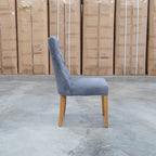 The Semillon Upholstered Natural Frame Dining Chair - Share Charcoal available to purchase from Warehouse Furniture Clearance at our next sale event.