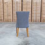 The Semillon Upholstered Natural Frame Dining Chair - Share Charcoal available to purchase from Warehouse Furniture Clearance at our next sale event.