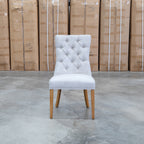 The Semillon Upholstered Natural Frame Dining Chair - Share Oat available to purchase from Warehouse Furniture Clearance at our next sale event.