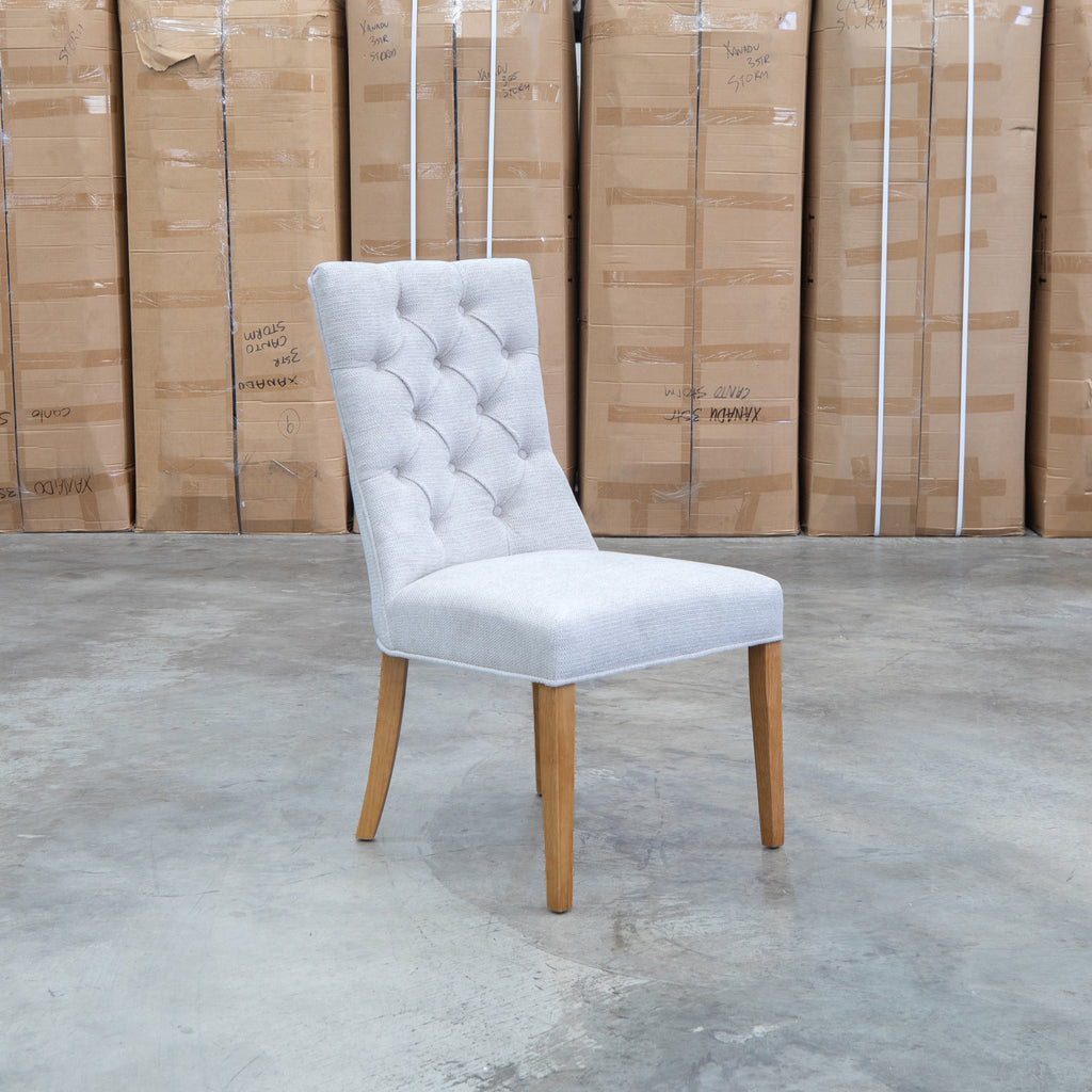 The Semillon Upholstered Natural Frame Dining Chair - Share Oat available to purchase from Warehouse Furniture Clearance at our next sale event.