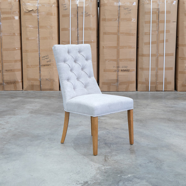 The Semillon Upholstered Natural Frame Dining Chair - Share Oat available to purchase from Warehouse Furniture Clearance at our next sale event.