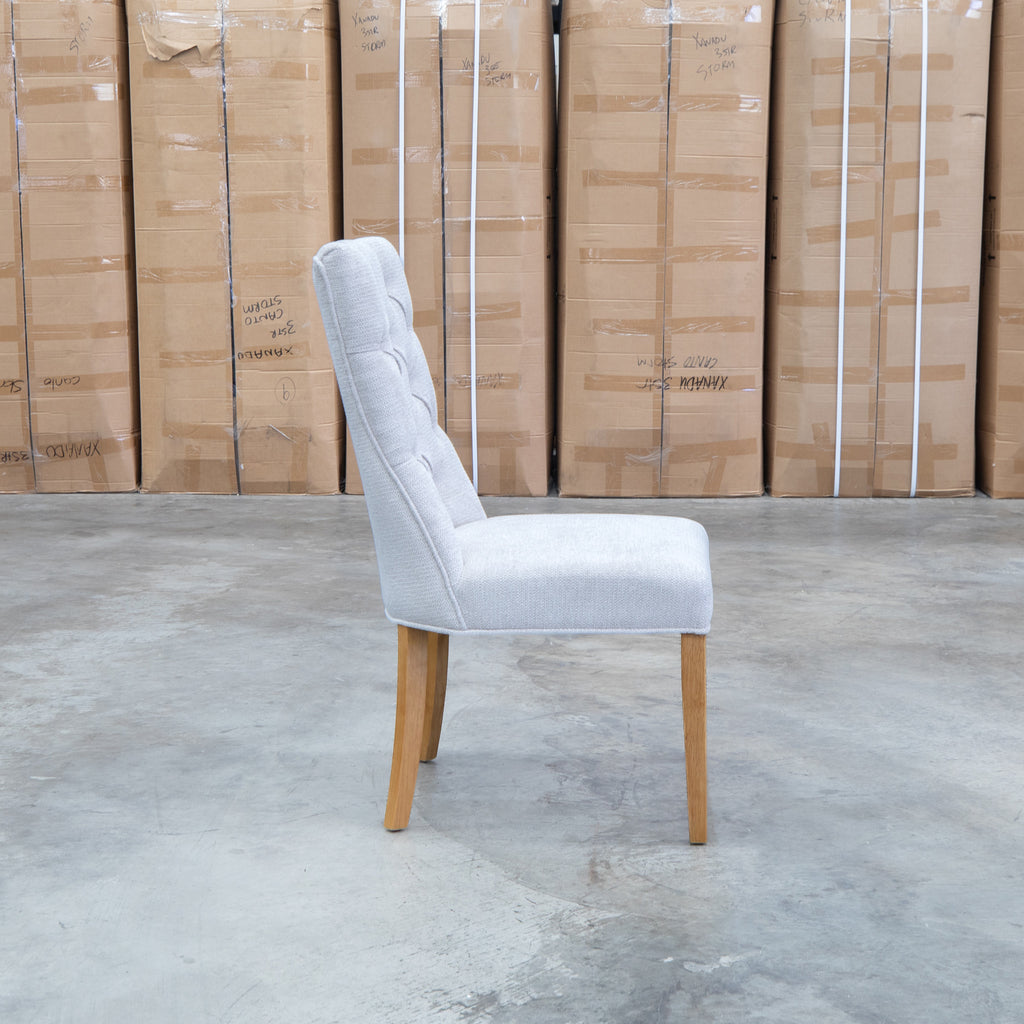 The Semillon Upholstered Natural Frame Dining Chair - Share Oat available to purchase from Warehouse Furniture Clearance at our next sale event.