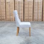 The Semillon Upholstered Natural Frame Dining Chair - Share Oat available to purchase from Warehouse Furniture Clearance at our next sale event.