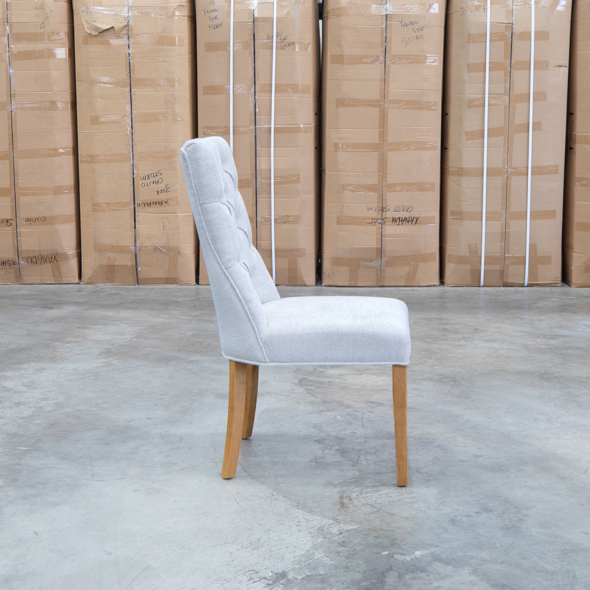 The Semillon Upholstered Natural Frame Dining Chair - Share Oat available to purchase from Warehouse Furniture Clearance at our next sale event.