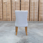 The Semillon Upholstered Natural Frame Dining Chair - Share Oat available to purchase from Warehouse Furniture Clearance at our next sale event.