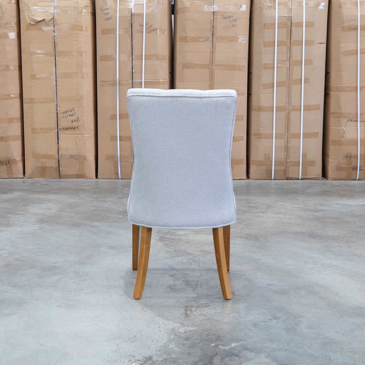 The Semillon Upholstered Natural Frame Dining Chair - Share Oat available to purchase from Warehouse Furniture Clearance at our next sale event.