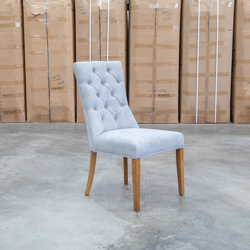 The Semillon Upholstered Natural Frame Dining Chair - Share Slate available to purchase from Warehouse Furniture Clearance at our next sale event.
