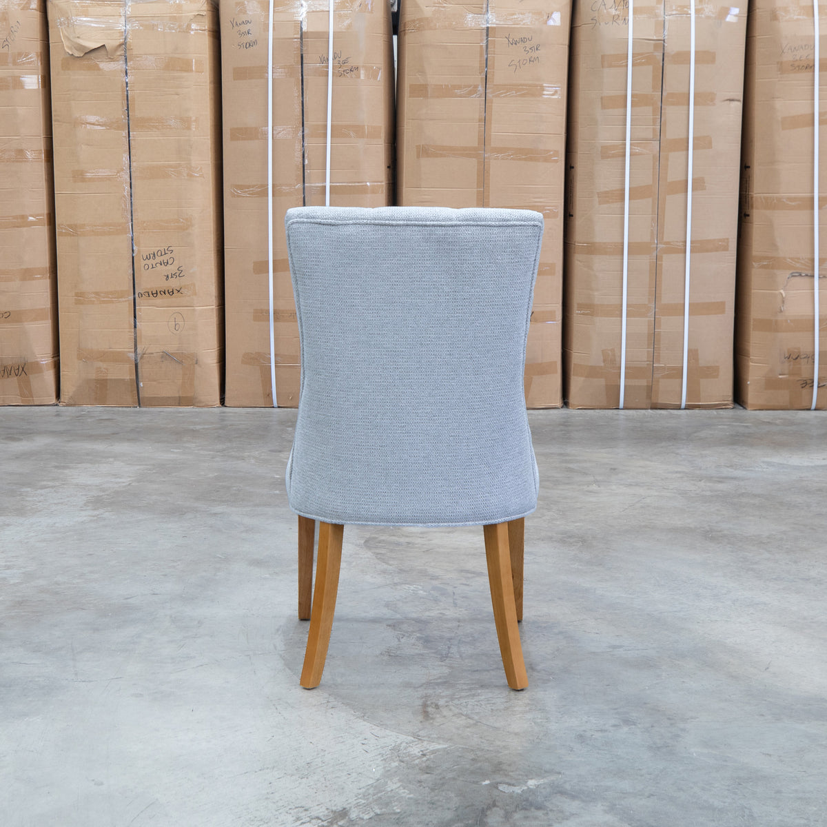 The Semillon Upholstered Natural Frame Dining Chair - Share Slate available to purchase from Warehouse Furniture Clearance at our next sale event.