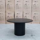 The Semillon New Zealand Ash 135cm Round Dining Table - Black available to purchase from Warehouse Furniture Clearance at our next sale event.