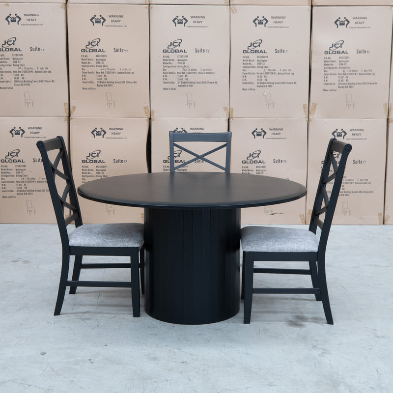 The Semillon New Zealand Ash 135cm Round Dining Table - Black available to purchase from Warehouse Furniture Clearance at our next sale event.