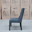 The Semillon Upholstered Black Frame Dining Chair - Charcoal available to purchase from Warehouse Furniture Clearance at our next sale event.