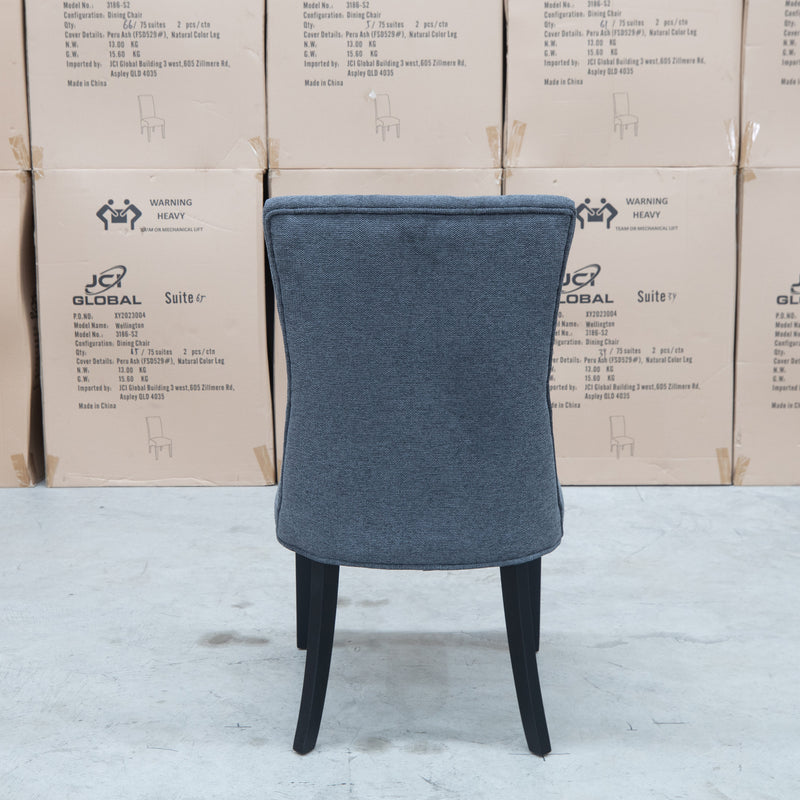 The Semillon Upholstered Black Frame Dining Chair - Charcoal available to purchase from Warehouse Furniture Clearance at our next sale event.