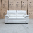 The Denton Leather Two Seater Sofa - Bianco available to purchase from Warehouse Furniture Clearance at our next sale event.