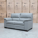 The Denton Leather Two Seater Sofa - Light Grey available to purchase from Warehouse Furniture Clearance at our next sale event.