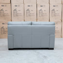 The Denton Leather Two Seater Sofa - Light Grey available to purchase from Warehouse Furniture Clearance at our next sale event.