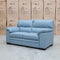 The Denton Leather Two Seater Sofa - Sky available to purchase from Warehouse Furniture Clearance at our next sale event.