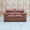 The Denton Leather Two Seater Sofa - Cognac available to purchase from Warehouse Furniture Clearance at our next sale event.