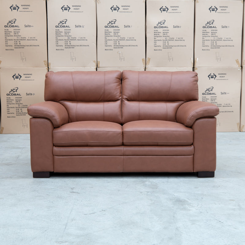 The Denton Leather Two Seater Sofa - Cognac available to purchase from Warehouse Furniture Clearance at our next sale event.