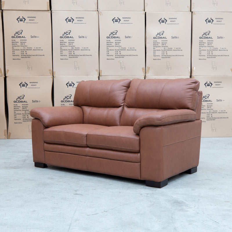 The Denton Leather Two Seater Sofa - Cognac available to purchase from Warehouse Furniture Clearance at our next sale event.