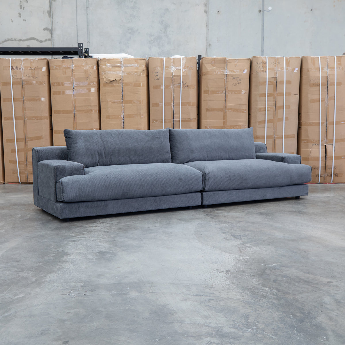 The Solstice Feather & Foam Oversized Four Seat Sofa - Carbon available to purchase from Warehouse Furniture Clearance at our next sale event.