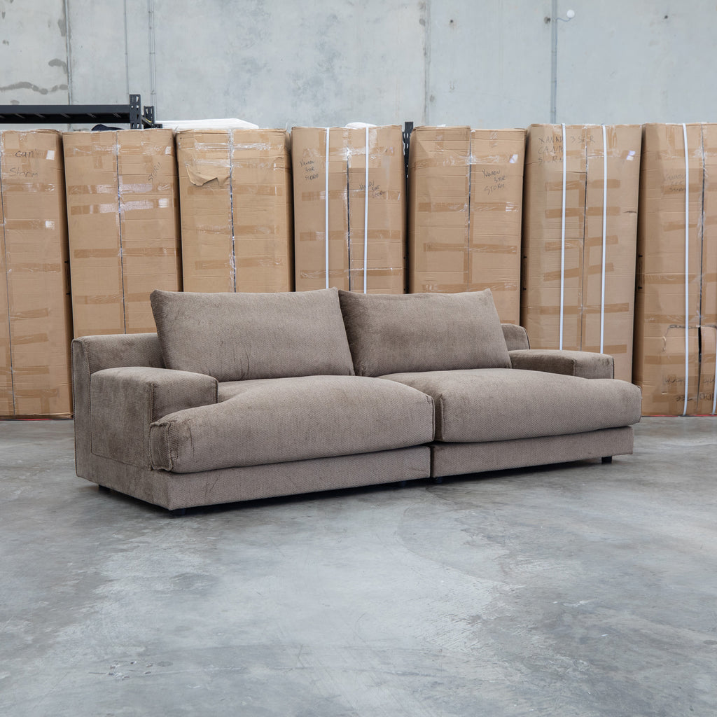 The Solstice Feather & Foam Oversized Three Seat Sofa - Chocolate available to purchase from Warehouse Furniture Clearance at our next sale event.