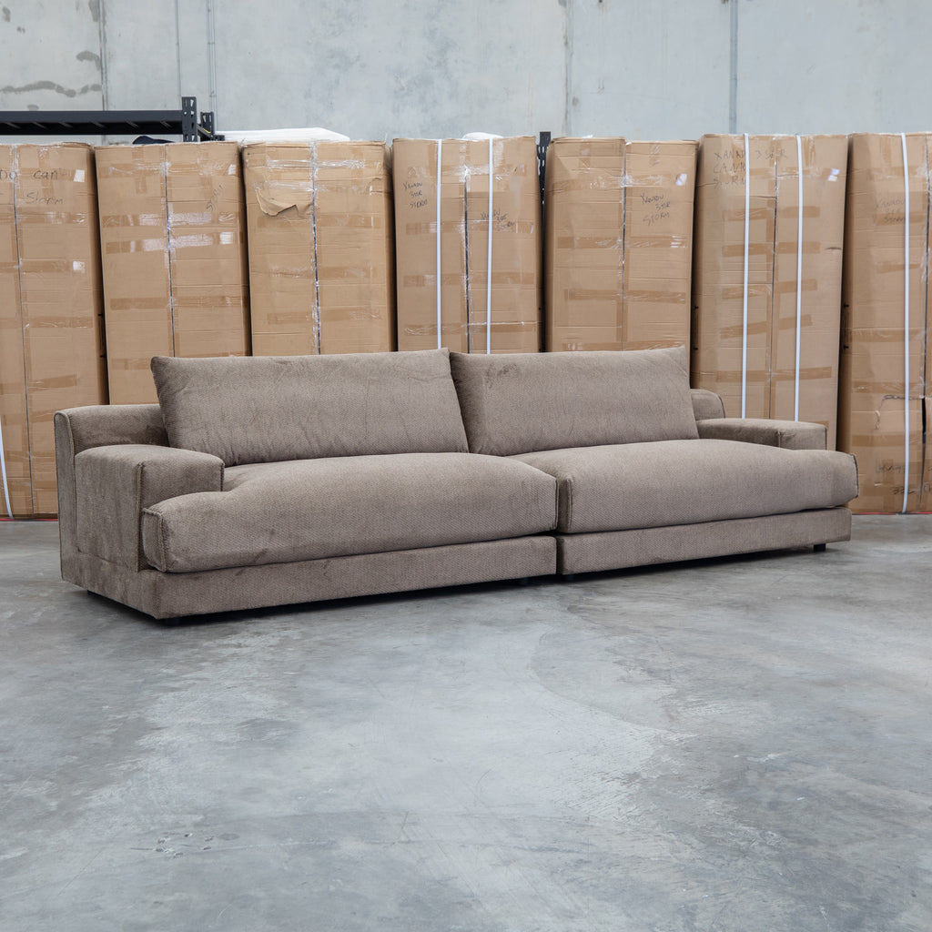 The Solstice Feather & Foam Oversized Four Seat Sofa - Chocolate available to purchase from Warehouse Furniture Clearance at our next sale event.