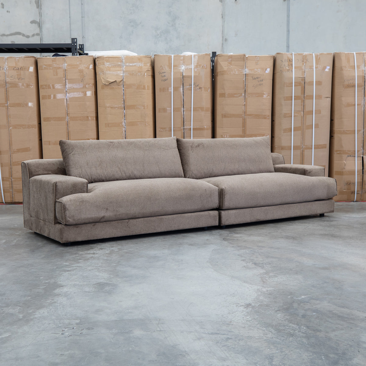 The Solstice Feather & Foam Oversized Four Seat Sofa - Chocolate available to purchase from Warehouse Furniture Clearance at our next sale event.