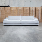 The Solstice Feather & Foam Oversized Four Seat Sofa - Oat available to purchase from Warehouse Furniture Clearance at our next sale event.