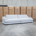 The Solstice Feather & Foam Oversized Four Seat Sofa - Oat available to purchase from Warehouse Furniture Clearance at our next sale event.
