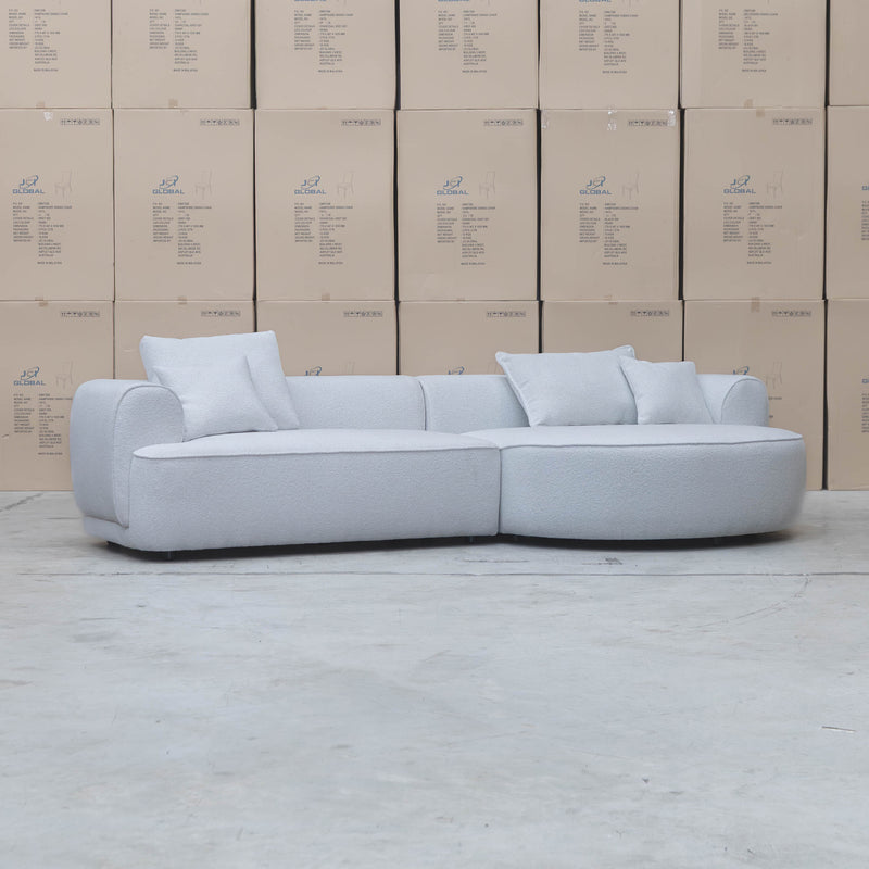 The Sorrento Curved RHF Chaise Lounge - Cloud available to purchase from Warehouse Furniture Clearance at our next sale event.