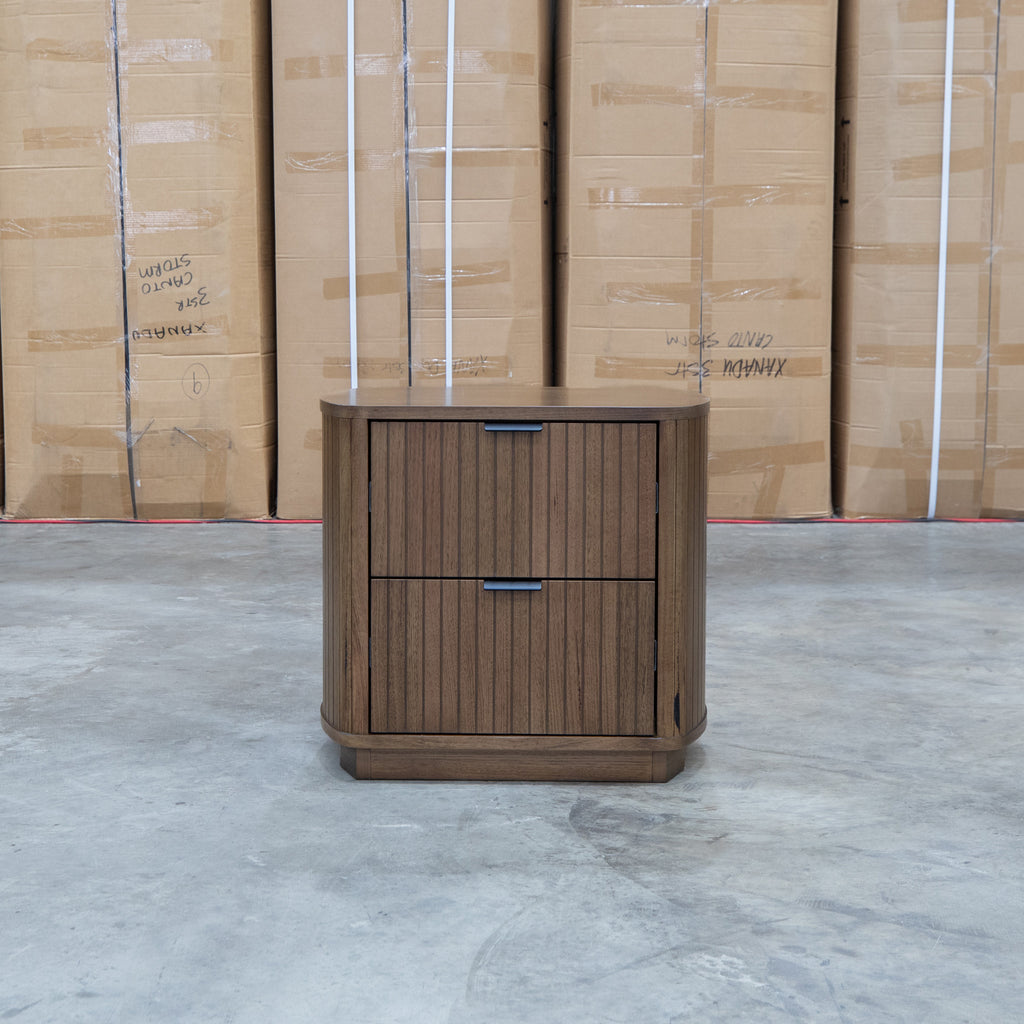 The Bentley Curved Two Drawer Australian Messmate Hardwood Bedside - Smoke available to purchase from Warehouse Furniture Clearance at our next sale event.