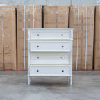 The Bruges Antique White Four Drawer Tallboy available to purchase from Warehouse Furniture Clearance at our next sale event.