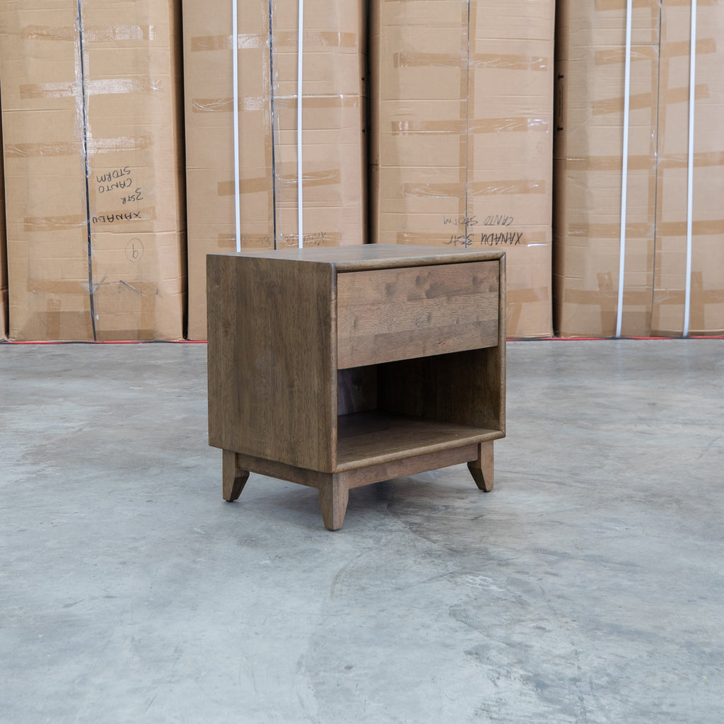 The Benton 1 Drawer/ 1 Shelf Bedside - Walnut available to purchase from Warehouse Furniture Clearance at our next sale event.