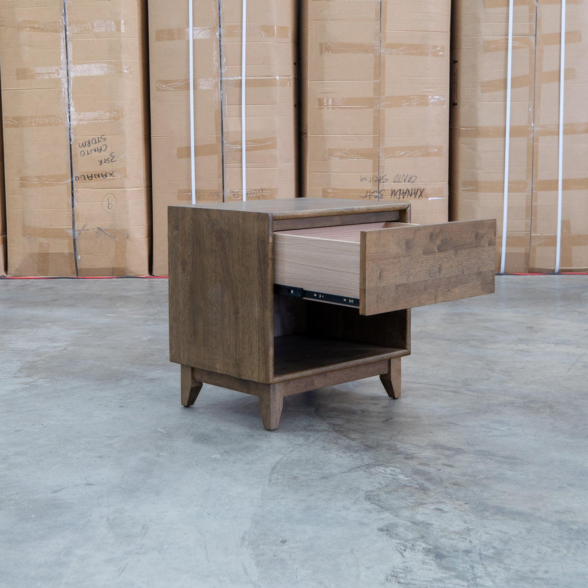 The Benton 1 Drawer/ 1 Shelf Bedside - Walnut available to purchase from Warehouse Furniture Clearance at our next sale event.