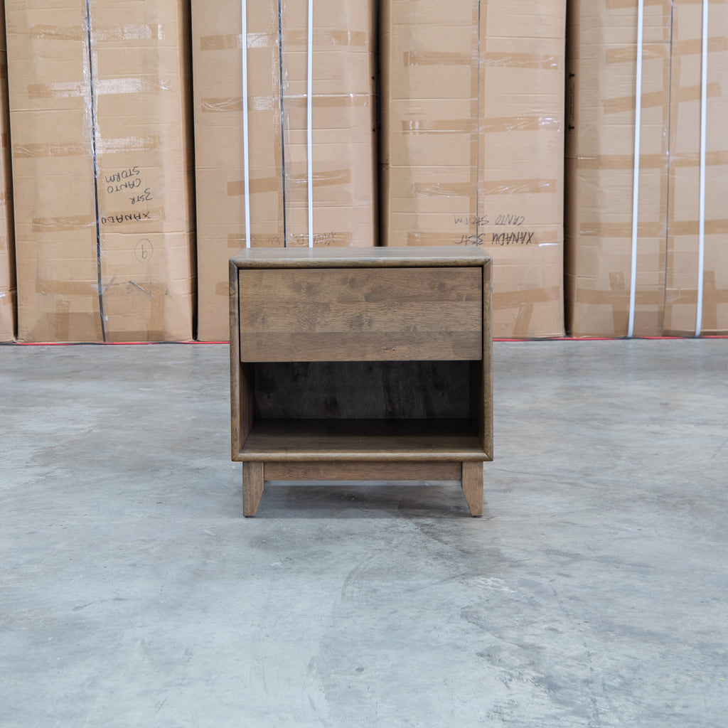 The Benton 1 Drawer/ 1 Shelf Bedside - Walnut available to purchase from Warehouse Furniture Clearance at our next sale event.