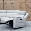 The Stratton Modular Corner Lounge with Dual Electric Recliners - Light Grey Leather available to purchase from Warehouse Furniture Clearance at our next sale event.