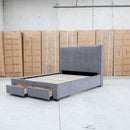 The Talia Queen Fabric Storage Bed - Storm available to purchase from Warehouse Furniture Clearance at our next sale event.