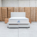 The Talia Double Fabric Storage Bed - Bone available to purchase from Warehouse Furniture Clearance at our next sale event.
