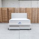The Talia Double Fabric Storage Bed - Bone available to purchase from Warehouse Furniture Clearance at our next sale event.