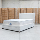 The Talia Double Fabric Storage Bed - Bone available to purchase from Warehouse Furniture Clearance at our next sale event.