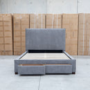 The Talia Queen Fabric Storage Bed - Storm available to purchase from Warehouse Furniture Clearance at our next sale event.