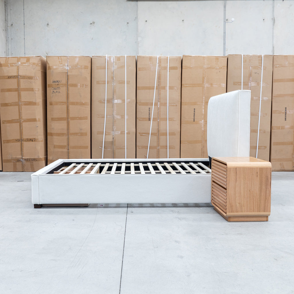 The Talia Double Fabric Storage Bed - Bone available to purchase from Warehouse Furniture Clearance at our next sale event.